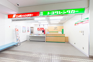 2-1. On the left side, there are NIPPON Rent a Car and TOYOTA Rent a Car counters.